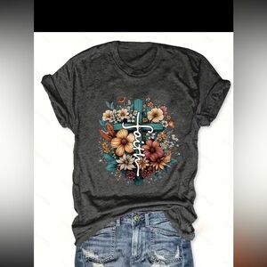 Faith Tshirt shorts sleeves new size Large in original  packaging